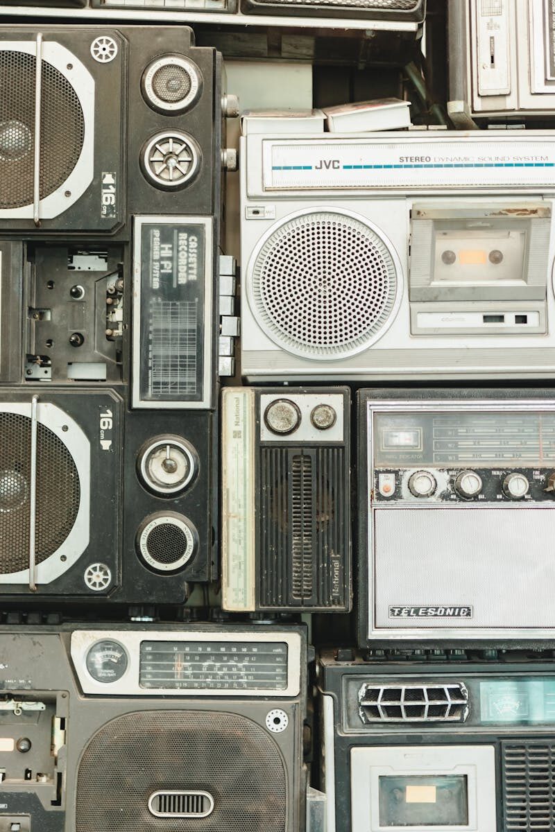 Close-up of vintage audio equipment featuring cassette and radio players.